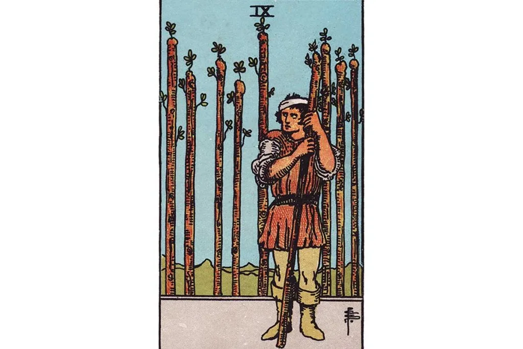 Nine of Wands Tarot Card Meaning: Resilience & Defense in Adversity